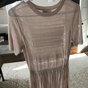 Sheer Beige peplum shirt